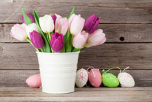 Easter Eggs And Colorful Tulips