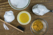 DIY toothpaste with ingredients, coconut oil, turmeric, baking soda, Xylitol and bamboo toothbrush