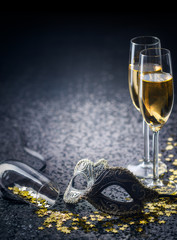 Wall Mural - mask and champagne with star shaped confetties