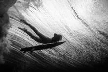 Underwater View Of A Surfer Duck Diving A Wave In Lanzarote Island. The Canary Islands, Spain.