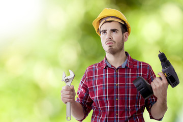 builder tools and construction helmet