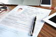 © Africa Studio - Resume and pen on wooden table