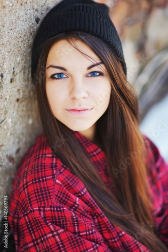 Portrait Of Young Beautiful Confident Girls Brunette With Blue