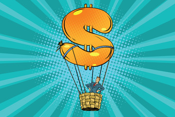 businessman in a hot air balloon dollar