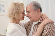 © Africa Studio - Closeup portrait of happy senior couple at home