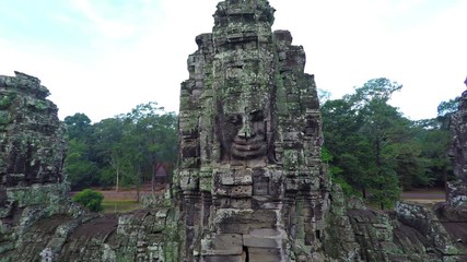 Canvas Print - Stone tower with a human face. Cambodia Bayon temple