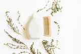 Flat lay bath products/ Natural bath products. Shampoo and wooden comb. Top view photography