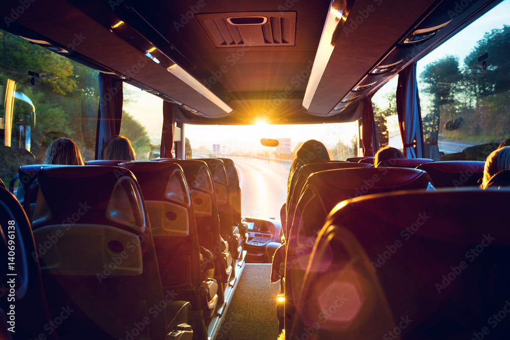 Bus innen Busreise in den Sonnenaufgang – Tour bus interior - obrazy, fototapety, plakaty 