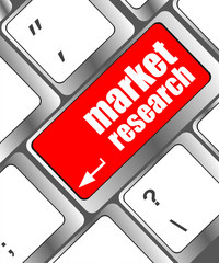 Poster - key with market research text on laptop keyboard, business concept