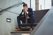 © WavebreakMediaMicro - Depressed businessman sitting on stairs