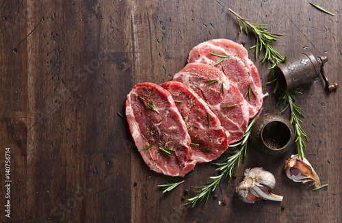 Fotografie, Obraz Pork steak with rosemary, garlic and pepper , free space for your text
