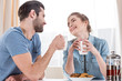 © LIGHTFIELD STUDIOS - Couple drinking tea