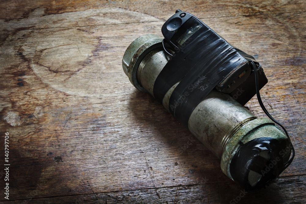 Spring Loaded Ied Steel pipe explosive (IED) is ignited by cell phone. Stock Photo ...