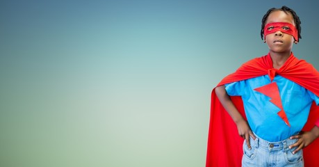 Wall Mural - Boy in superhero costume standing with his hands on his waist