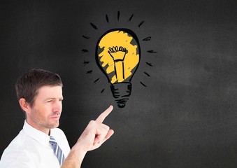 Poster - Digital composite image of businessman touching light blub