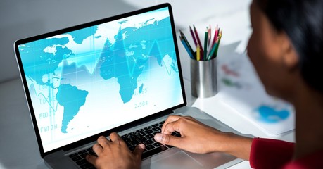 Poster - Woman working on laptop at desk