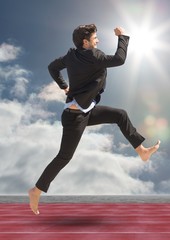 Wall Mural - Businessman running on racing track