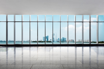 Canvas Print - empty floor and cityscape of modern city from window