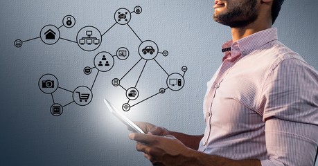 Poster - Man holding digital tablet with networking icons in background