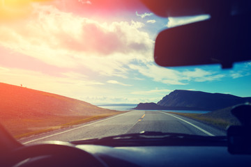 Driving a car on mountain road. Nature Norway. Polar circle. The way to Nordkapp