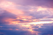© olezzo - Bright colourful sunset sky with sunlight and clouds. Natural background and texture