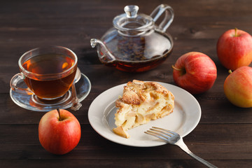 Wall Mural - Teapot, cup and hot tea.