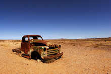 Rusted Car Hood In The African Desert