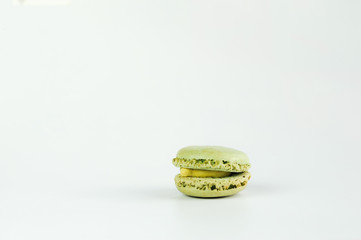 Single green macaron isolated