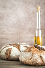 Poster - Loaves of bread with olive oil