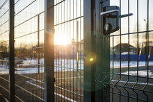 Entrance To The Playground Of Fence And The Wicket Of The Welded Wire Mesh Green Color With A Metal Lock And Handle