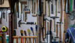 Variety of tools hung on wall of shed