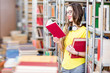 © rh2010 - Young happy and enthusiastic female student reading books at the old library