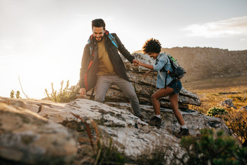 young couple hiking in nature