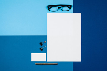 Poster - Mock-up magazine or catalog on colorful table. White page or notepad on modern background. Blank copy space for mockups or simulations.