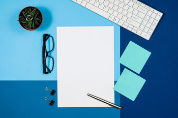Leinwandbilder - Mock-up magazine or catalog on colorful table. White page or notepad on modern background. Blank copy space for mockups or simulations.