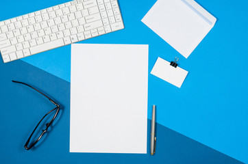 Leinwandbilder - Mock-up magazine or catalog on colorful table. White page or notepad on modern background. Blank copy space for mockups or simulations.