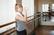 © nagaets - Young adult sexy boxing girl drinking water after training