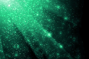 green star dust isolated on black background. design element.