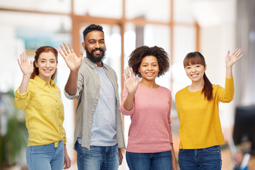 Wall Mural - international group of happy people waving hands