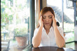 © chajamp - Woman has head ache at coffee shop