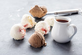 Fototapeta  - Vanilla and chocolate balls on background Scoop of chocolate ice cream Copy space