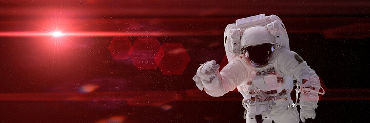 Wall Mural - astronaut hovering in space lit by a bright red star (3d illustration, background banner, elements o