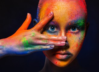 Wall Mural - Model with colorful art make-up, close-up