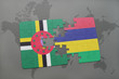 puzzle with the national flag of dominica and mauritius on a world map