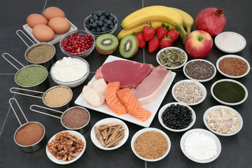 Wall Mural - Body Building Health Food Selection. With fresh and dried foods including supplement powders.