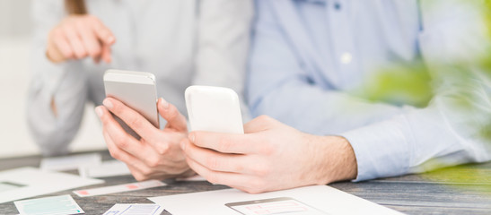designers drawing website ux app development.