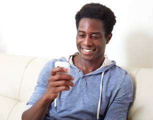 Canvas Print - Black man with smartphone