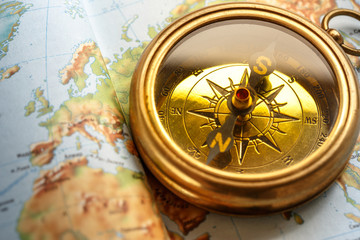 Compass on map background