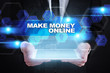 © WrightStudio - Businessman holding tablet PC with make money online concept.