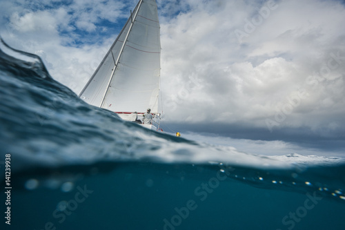 Valokuvatapetti Sailing boat from the underwater view